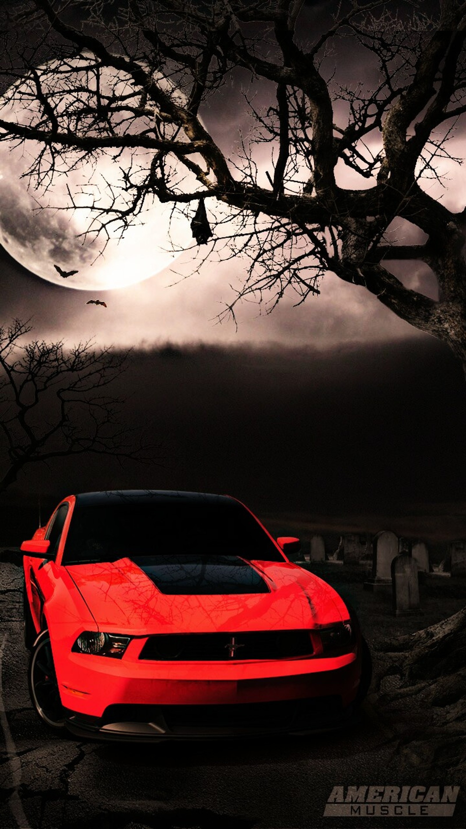 A close up of a red sports car parked in front of a tree (car, cars)