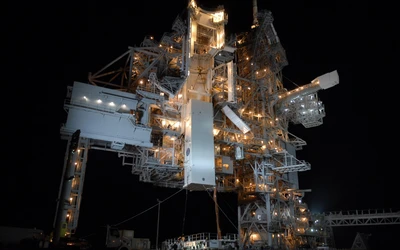 Illuminated Launch Pad at Night for Space Shuttle Operations