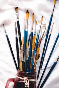 Artistic Inspiration: A Collection of Paintbrushes in a Jar