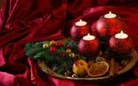 Elegant Christmas Still Life with Red Candles and Festive Decor