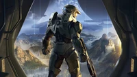 Master Chief blickt auf eine atemberaubende Landschaft, die von einem futuristischen Portal in "Halo Infinite" eingerahmt wird.