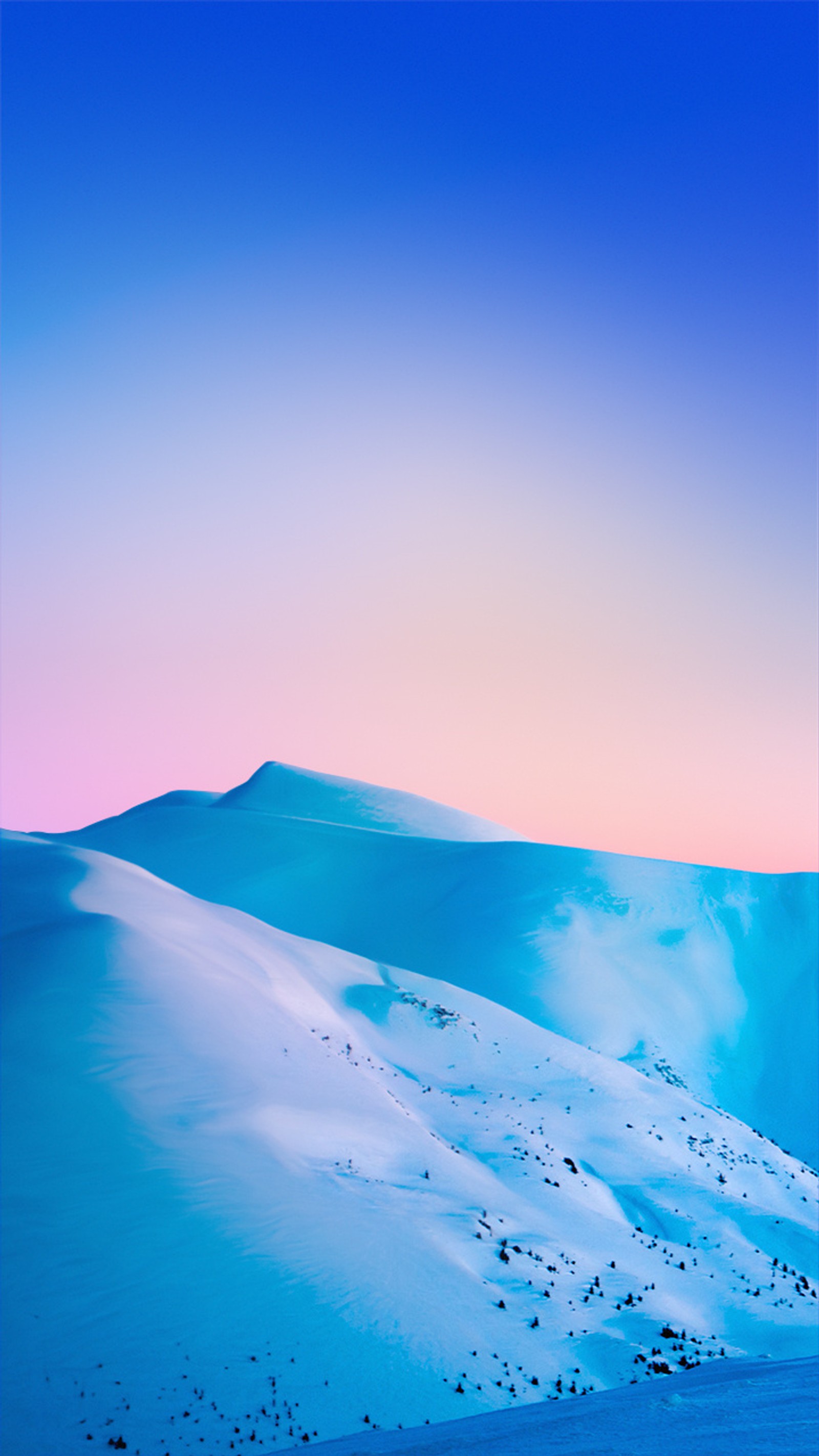 Skifahrer auf einem schneebedeckten berg mit einem rosa himmel im hintergrund (android, standard, miui 10, natur, aktie)