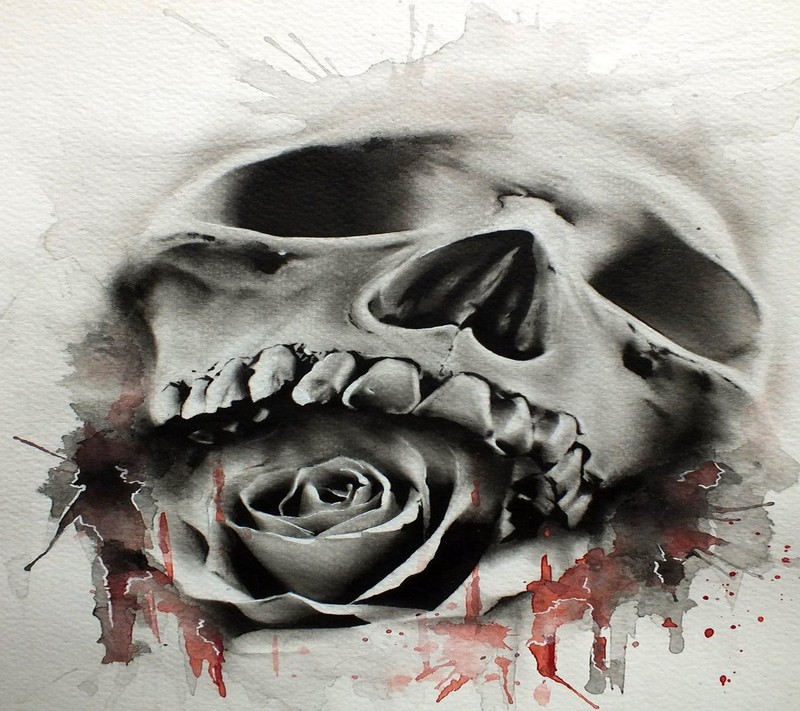 A close up of a skull and a rose on a white paper (nice, wallpaper)