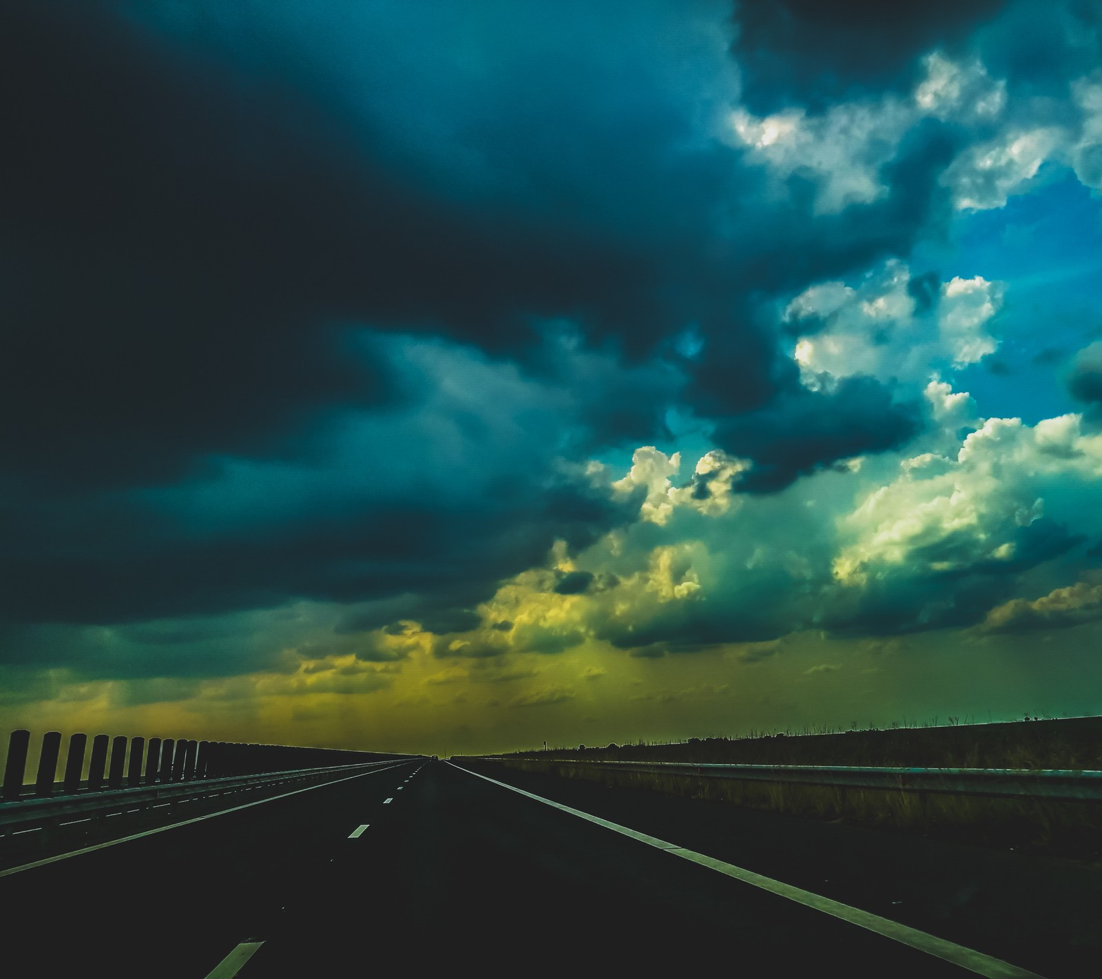 A close up of a highway with a sky background and a highway sign (leica, nature, the best)