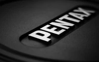 Monochrome Pentax Logo on Black Background