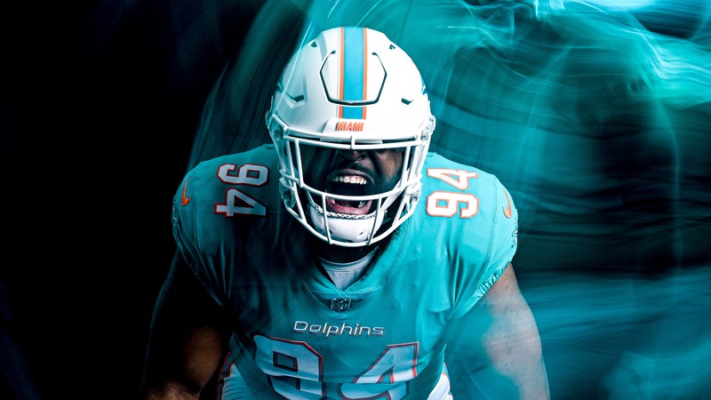 Арафед изображение футболиста в синей форме (майами долфинс, miami dolphins, christian wilkins, спорт, обои 4k)