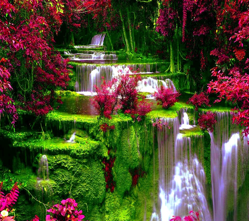 A close up of a waterfall in a lush green forest (landscape, wallpaper)