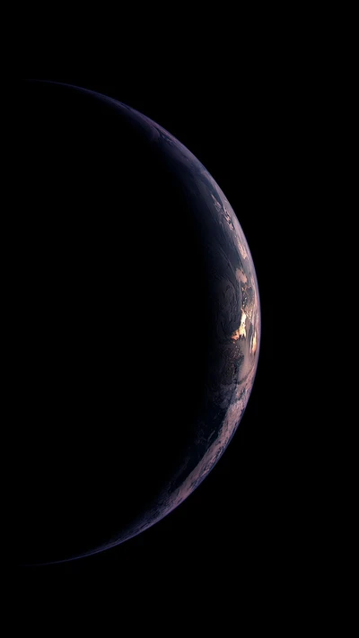 Earth's Serene Eclipse: A Dark Blue Planet in Space