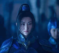 A fierce warrior in ornate blue armor, embodying strength and determination, set against a backdrop of ancient Chinese history.