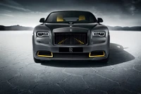 Atemberaubender Rolls Royce Wraith Black Badge vor einer dramatischen Landschaft