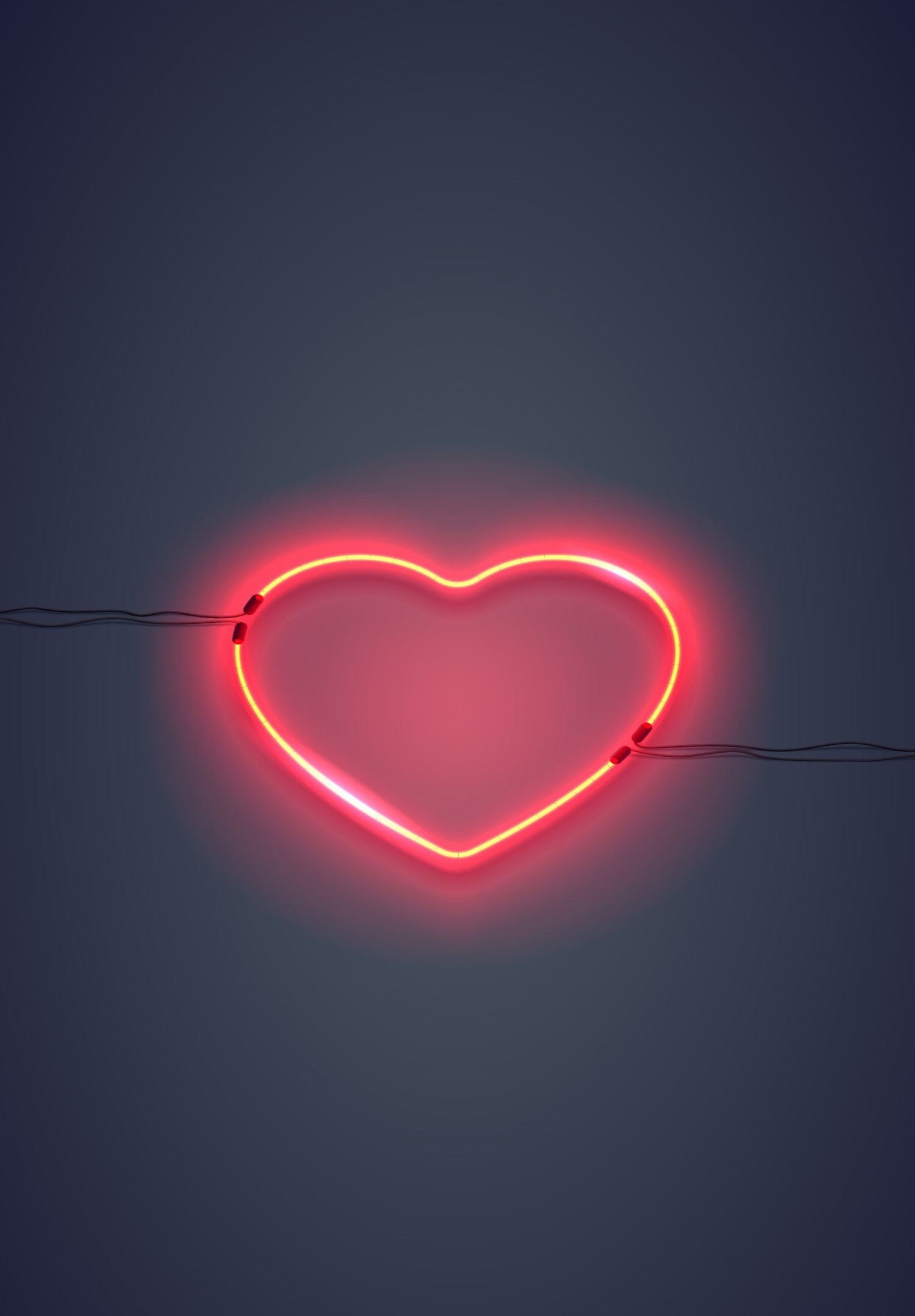 Neon heart sign on a wire against a dark background (neon sign, neon, lighting, light, red)