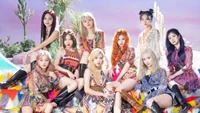 Foto grupal de TWICE del álbum "More & More": Moda vibrante y colorido entorno desértico