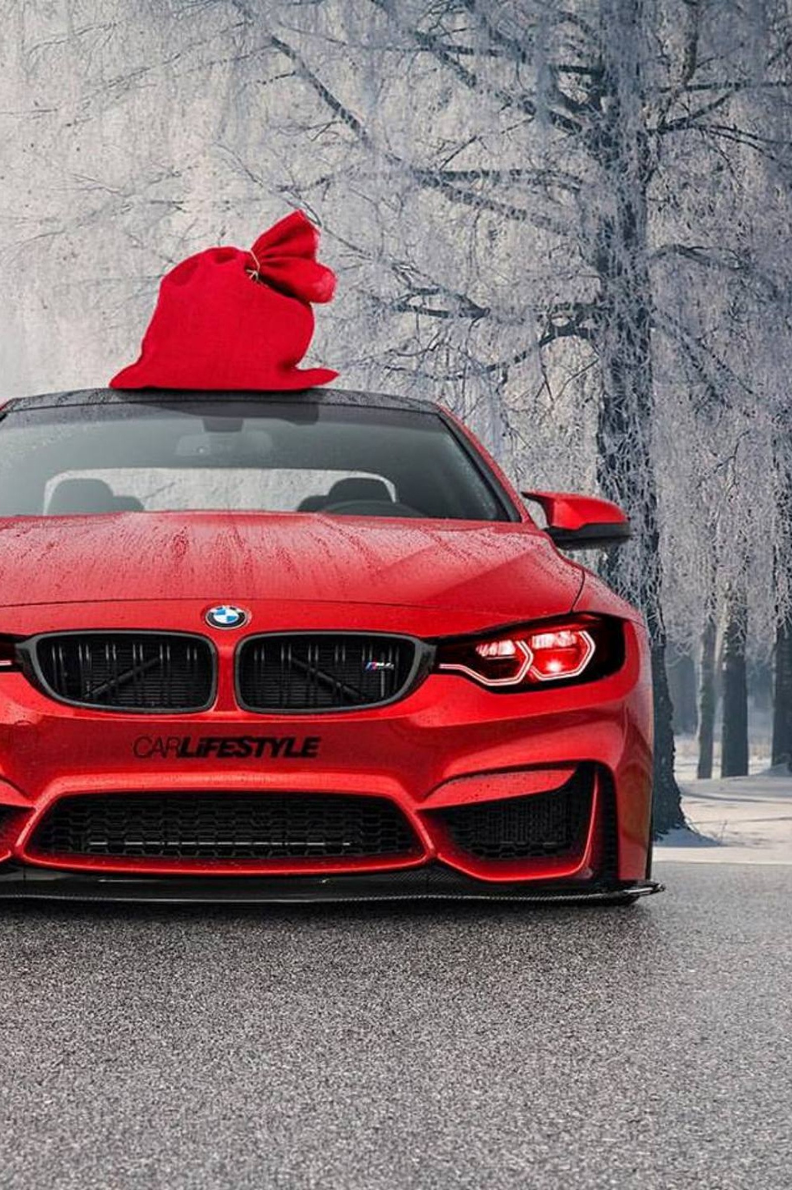 A close up of a red bmw car with a santa hat on top (bmw, car, m4, xmas)