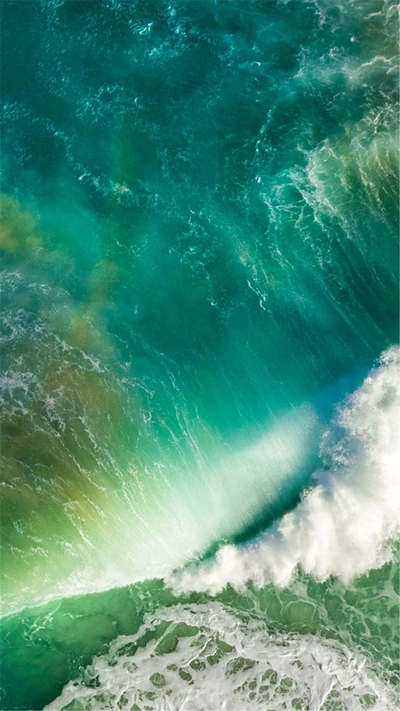 Vibrant Turquoise Waves Overlapping in a Coastal Scene