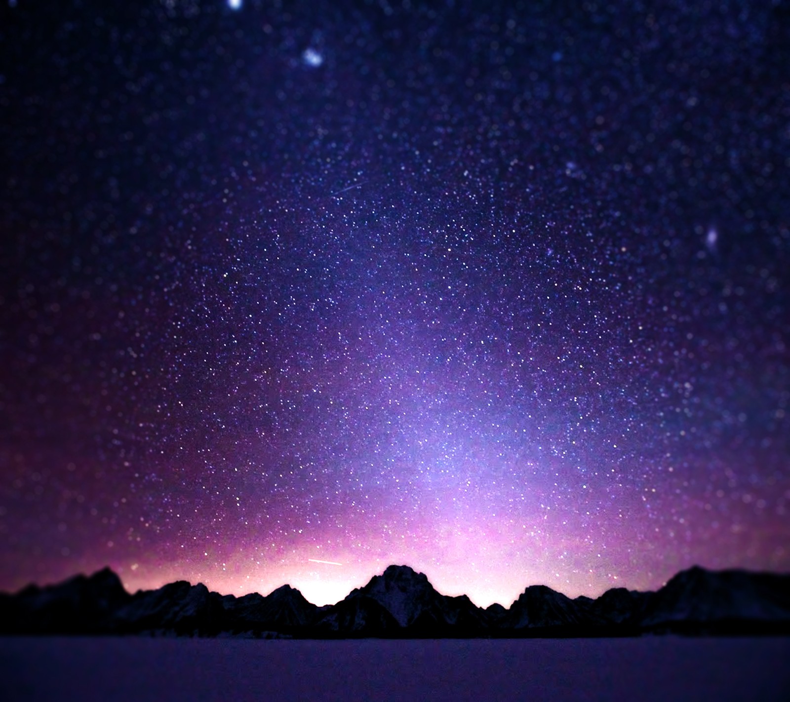 A view of a mountain range with a purple sky and stars (landscape, nature)