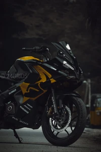 Sleek Black and Yellow Motorcycle in Urban Setting