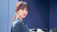 Myoui Mina: Poised Elegance in a K-Pop Setting