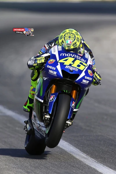 Valentino Rossi fazendo um wheeling em sua moto MotoGP