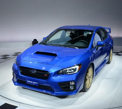 2015 Subaru WRX STI in lebhaftem Blau mit goldenen Rädern.