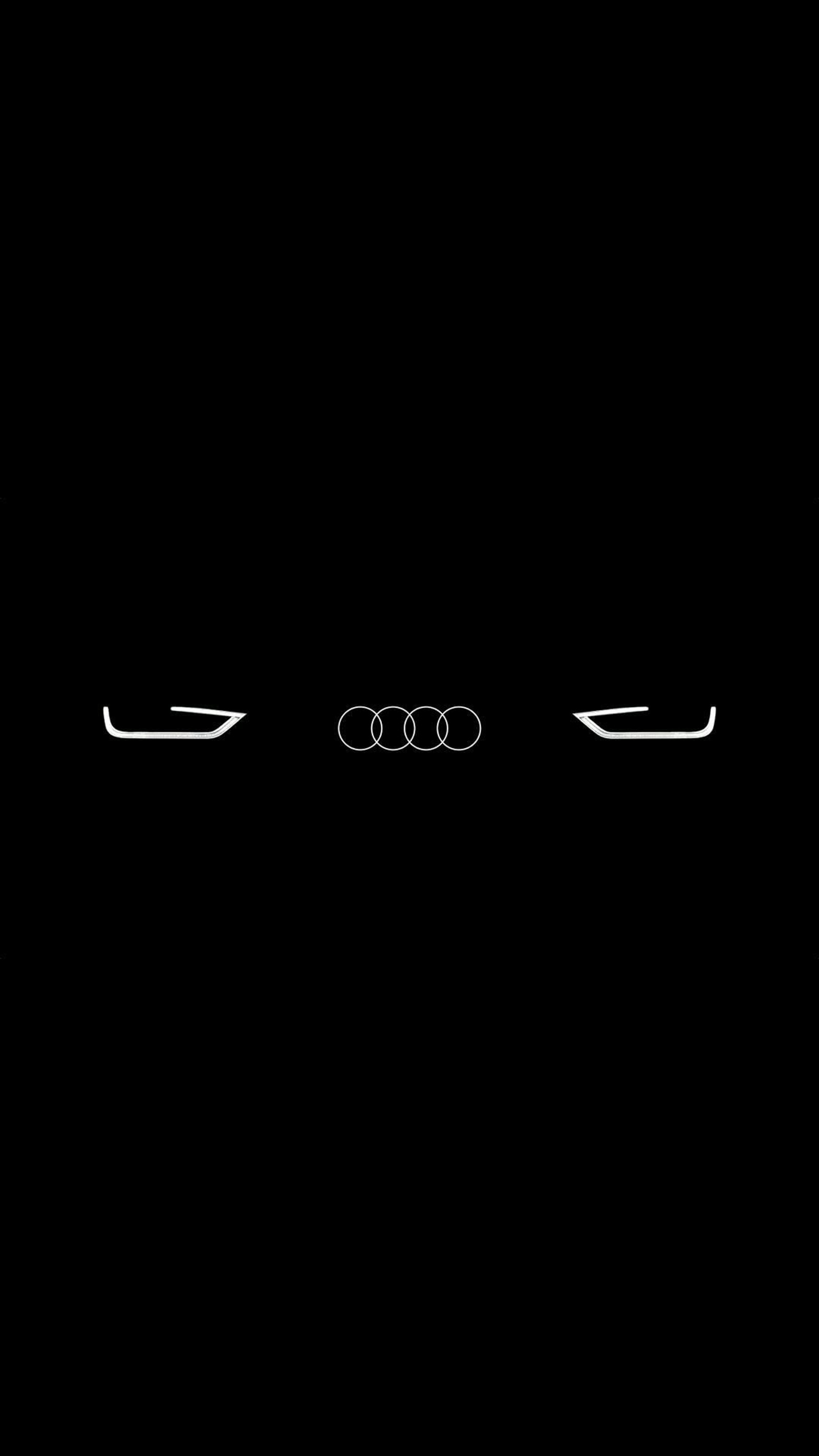 Un fondo negro con tres luces del logo de audi en la oscuridad (logotipo, led, puro, audi, rossi)