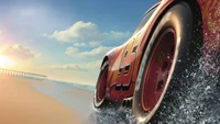 Lightning McQueen Racing Through the Waves at Sunset