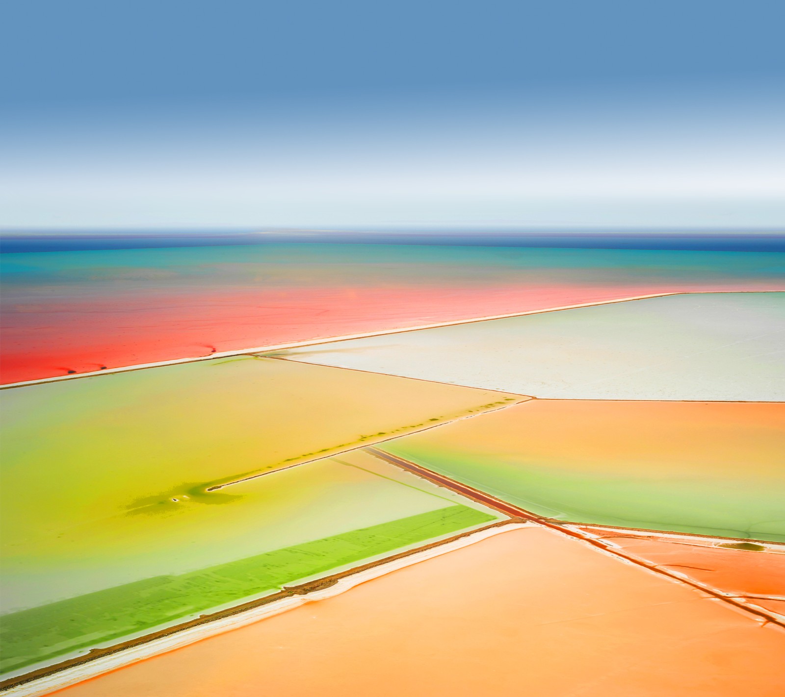 Arafed view of a salt pan with a red and green field (apple, ios, ipad)