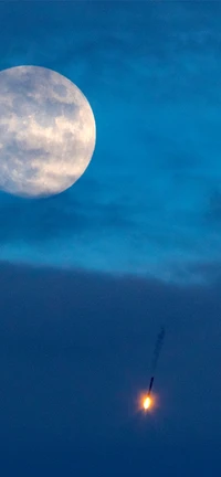 Lancement de fusée SpaceX sous un ciel majestueux éclairé par la lune