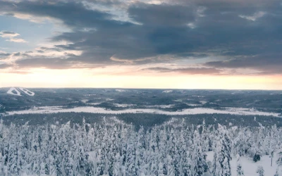 Tundra de inverno expansiva sob um céu ártico dramático