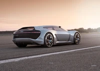 Voiture concept Audi R8 élégante sur la piste au coucher du soleil