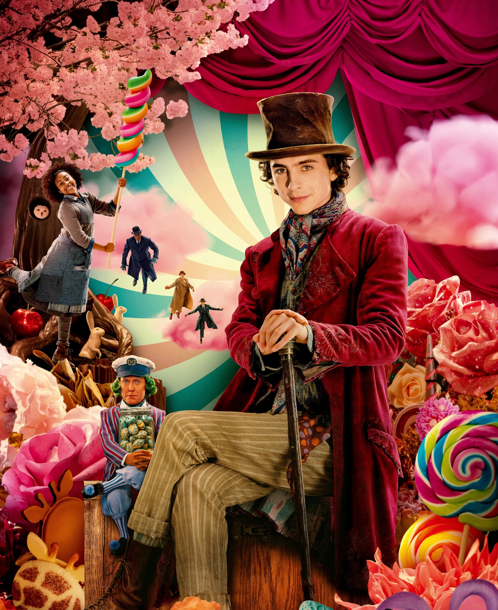 Image d'un homme en haut-de-forme assis sur un banc en bois entouré de bonbons (wonka, films 2023, timothée chalamet, films, fond décran 4k)