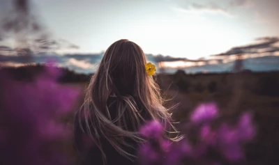 Serene Beauty: Long Hair with a Touch of Violet Under a Soft Sky