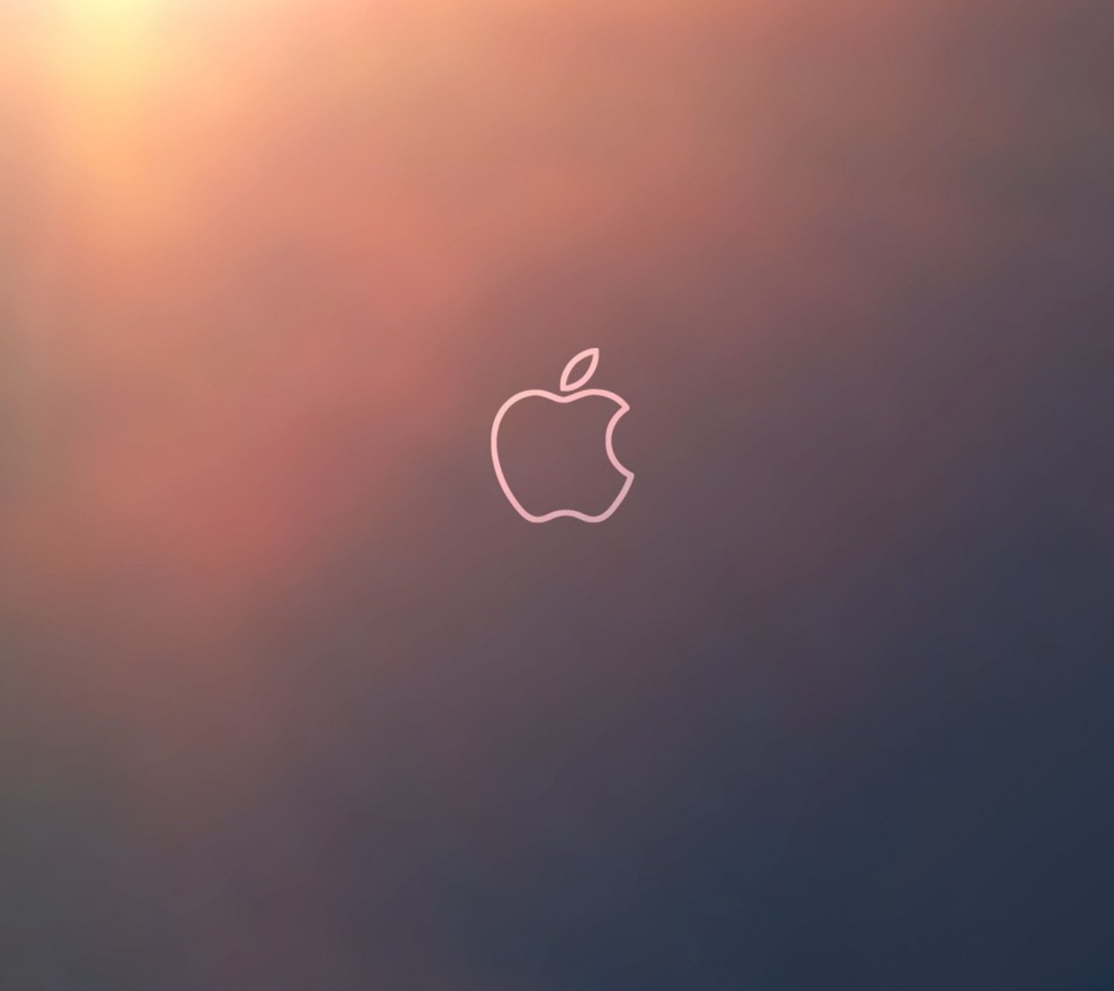 There is a apple logo on a cloudy sky with a sun in the background (apple, logo)