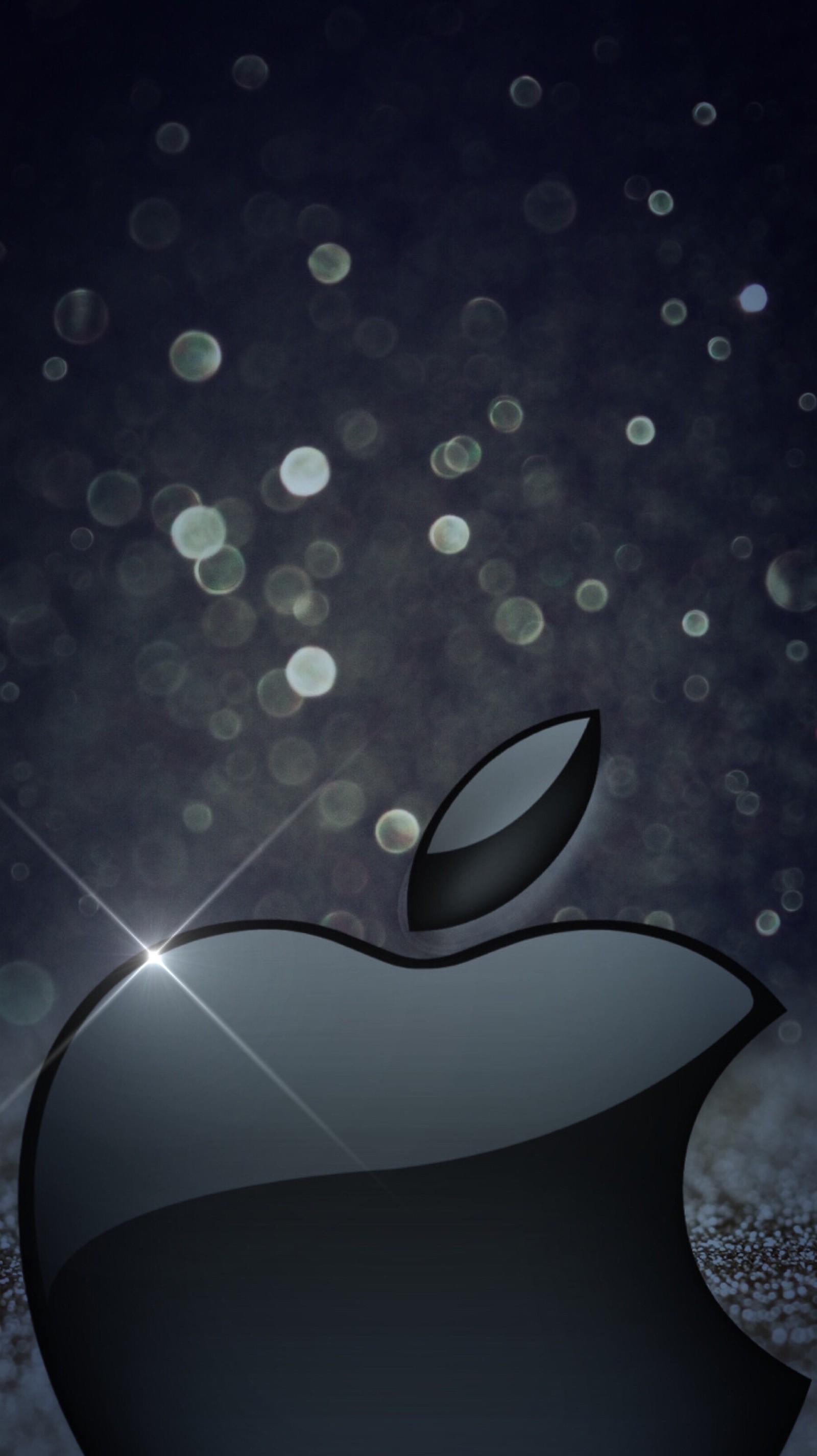 Un logo apple noir avec un diamant dessus (pomme, écran de verrouillage)