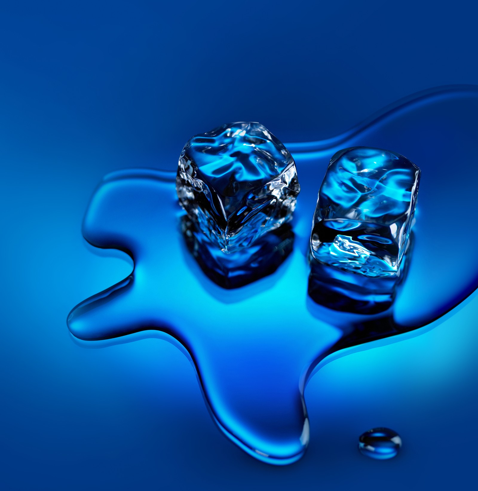 Two ice cubes sitting on a blue liquid covered surface (huawei, huawei honor 10, energy, matter, heat)