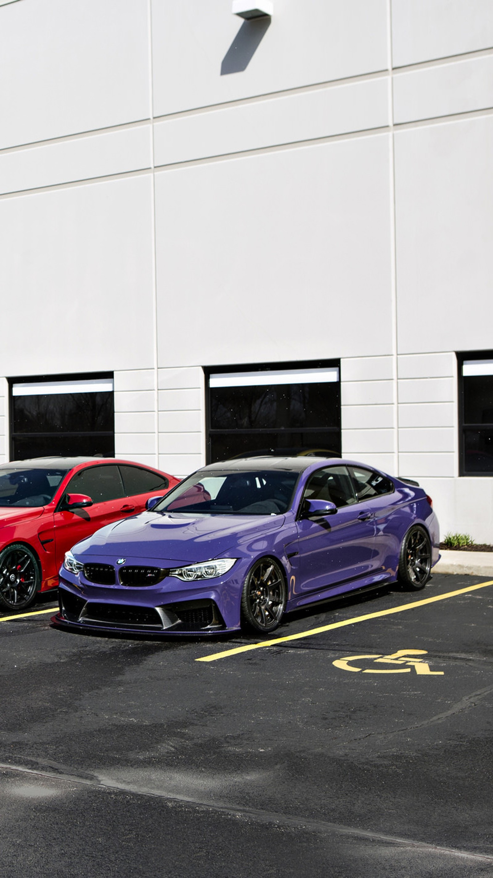 Three cars parked in a parking lot next to a building (auto, bmw, car, coupe, f82)