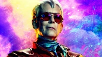 Patrica Tannis from the Borderlands movie, featuring a vibrant cosmic backdrop and distinctive sunglasses.