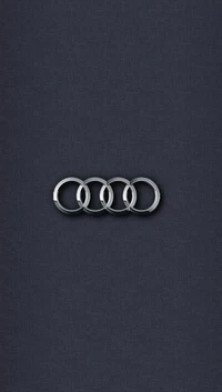 Логотип Audi на темном фоне