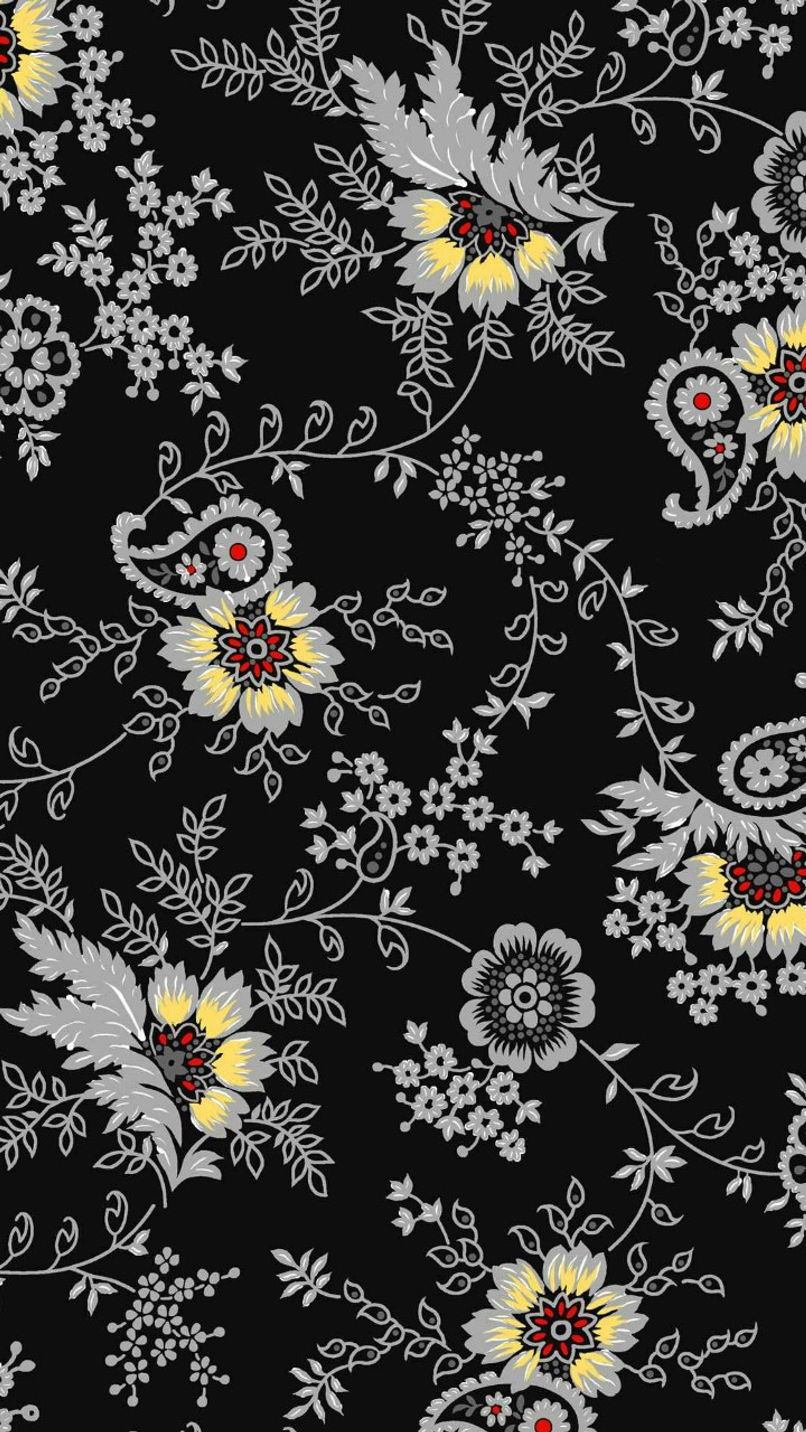 A close up of a black and yellow floral pattern (black, design, flower)