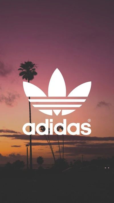 Logotipo da Adidas Originals contra um vibrante céu de pôr do sol