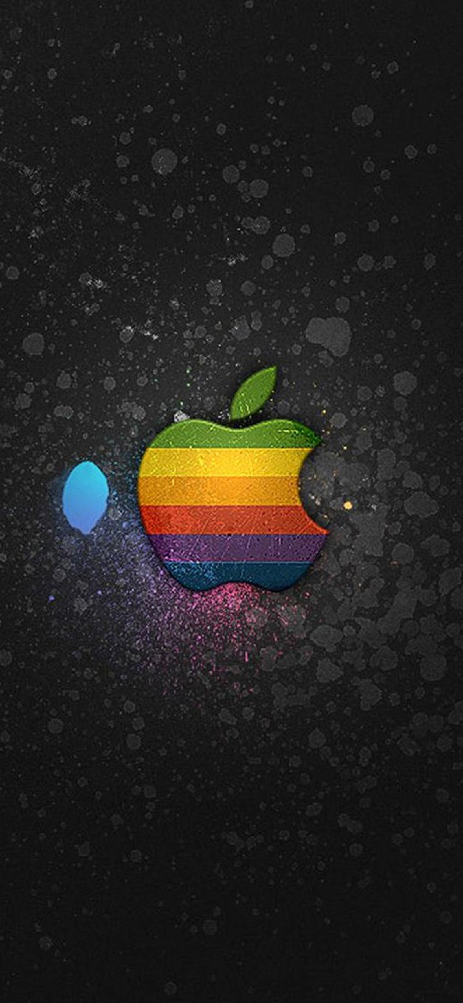 A close up of an apple logo with a blue ball (graphics, colorfulness, fruit, plant, space)