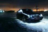 Sleek Mercedes Benz CLK Class with Alloy Wheels Under City Lights