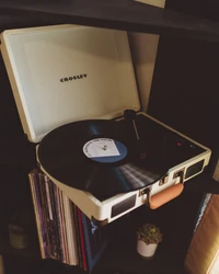 Vintage Crosley Turntable with Phonograph Record and Vinyl Collection