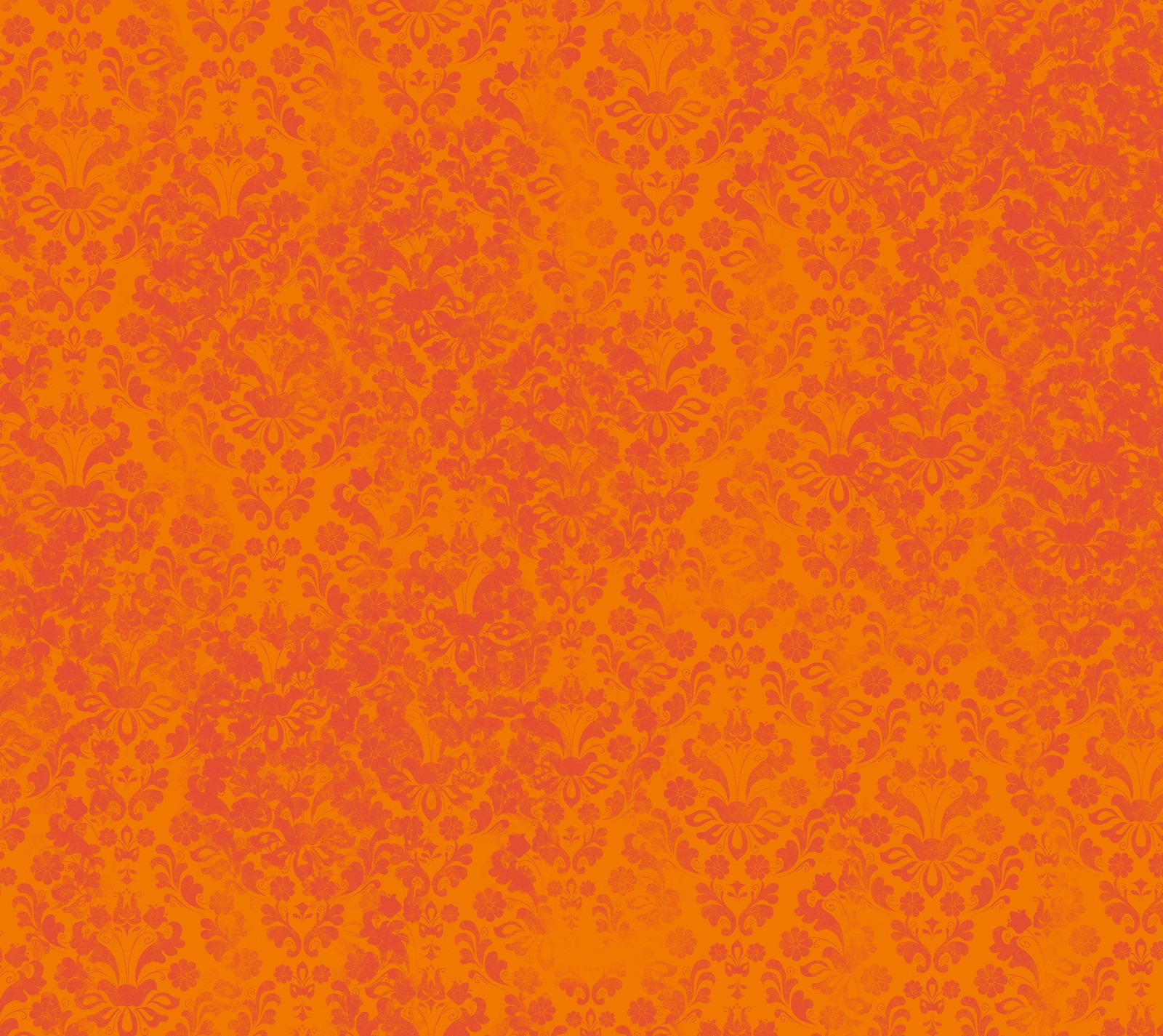 An orange and red background with a pattern of small flowers (orange, pattern)