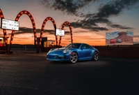 Porsche 911 Carrera GTS Sally Especial contra un impresionante fondo de atardecer