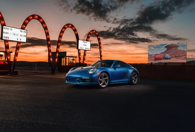 Porsche 911 Carrera GTS Sally Especial contra um deslumbrante fundo de pôr do sol