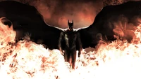 Batman émerge des flammes, incarnant la force et la détermination sur un fond dramatique.