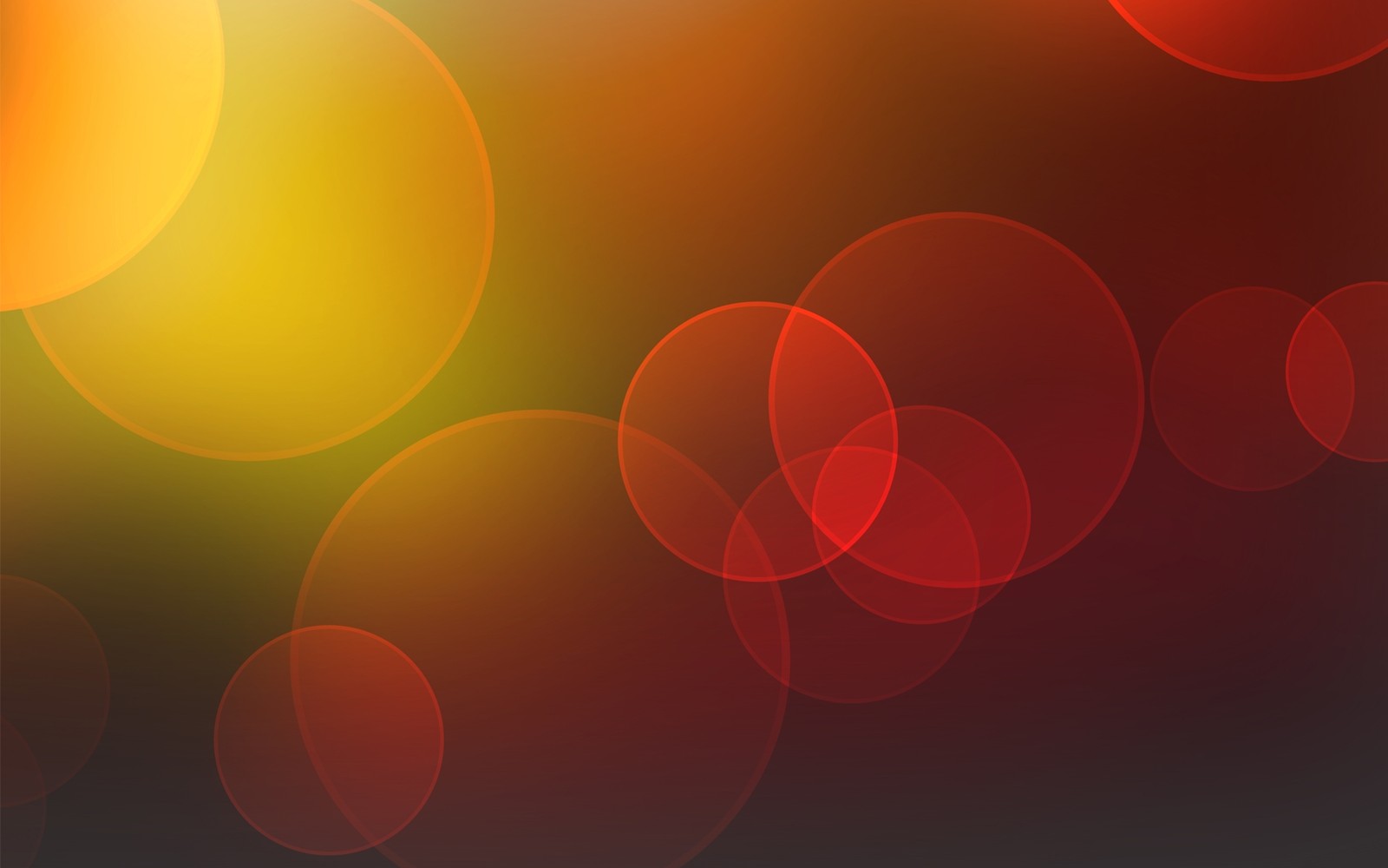 Blurred image of a red and yellow background with circles (red, orange, circle, texture mapping, font)