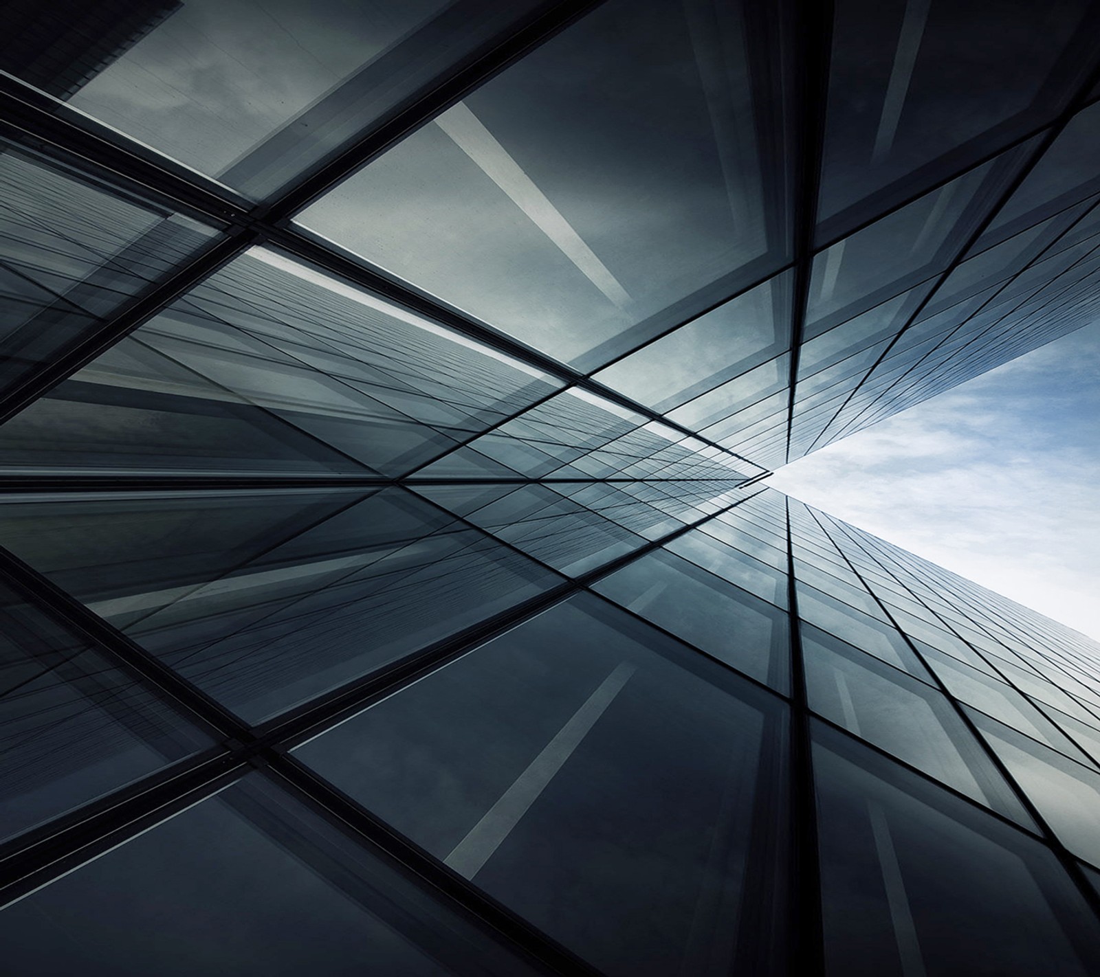 Arafed view of a glass building with a sky background (abstract, htc)