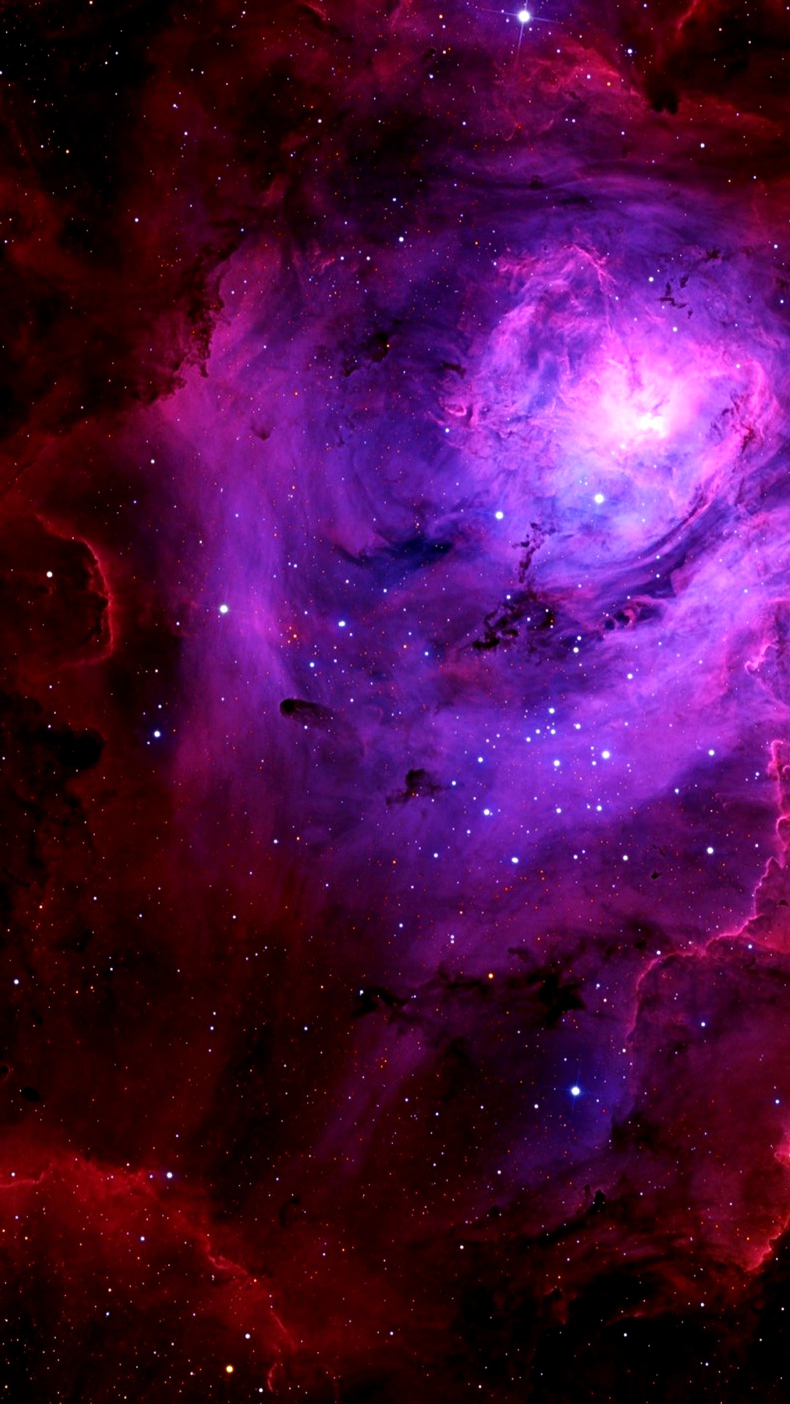 Una nebulosa púrpura y roja con una formación estelar en el centro (cósmico, galaxia, naturaleza, nebulosa, rojo)