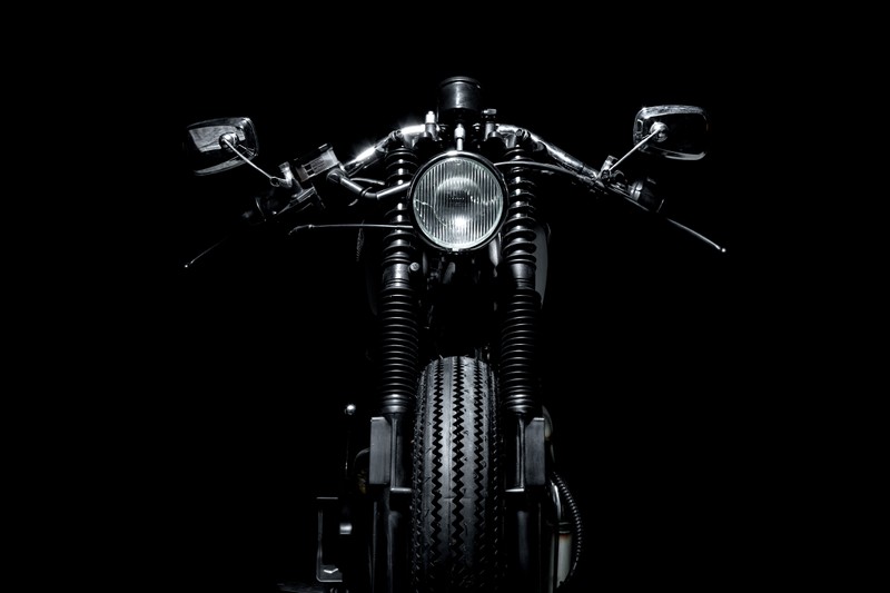 A close up of a motorcycle with a black background (abej, beograd, motorcycle, racer, tire)